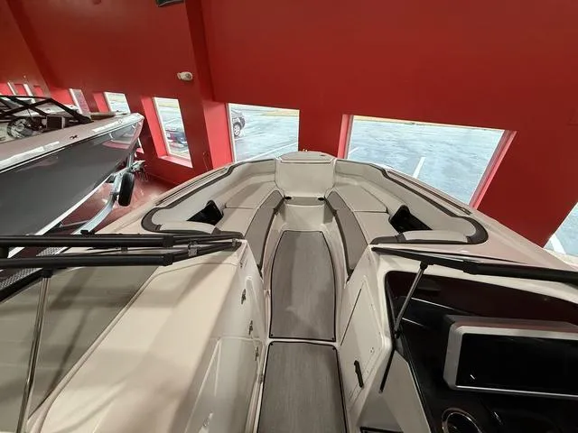 Slide: The Image of 2025 Yamaha Boats AR250 interior with sleek seating and modern design. - 12
