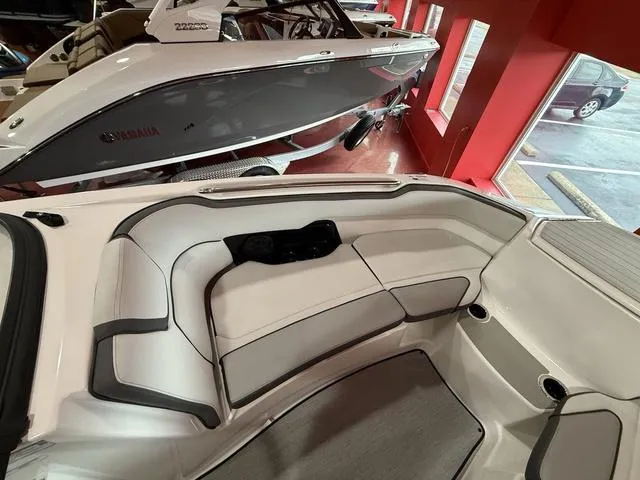 Slide: The Image of 2025 Yamaha Boats AR250 interior with sleek seating and modern design. - 13