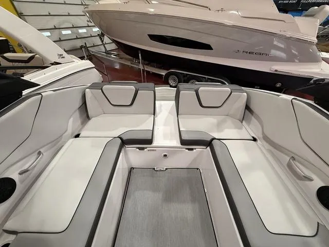Slide: The Image of 2025 Yamaha Boats AR250 interior with sleek seating and modern design. - 6