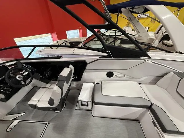 Slide: The Image of 2025 Yamaha Boats AR250 interior with sleek seating and modern design. - 8