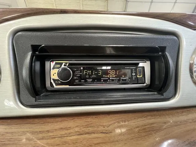 Slide: The Image of Kenwood stereo system in 2007 Harris Classic 240 I/O boat dashboard. - 14