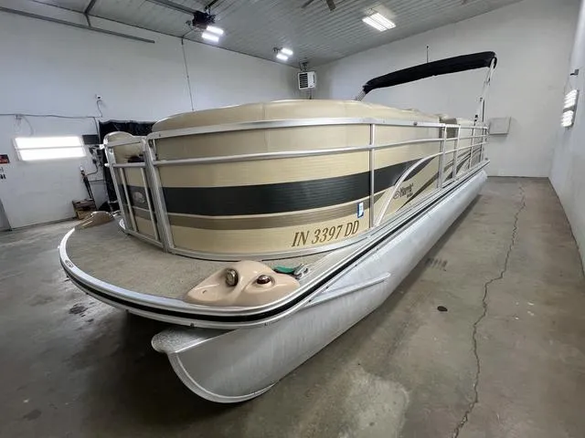 Slide: The Image of 2007 Harris Classic 240 I/O pontoon boat in indoor storage. - 4