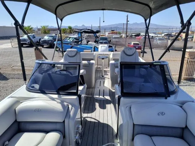 Slide: The Image of 2018 Avalon Excalibur Quad Lounge boat cruising with passengers on a sunny day. - 17