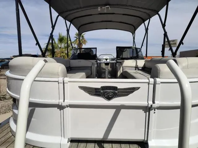Slide: The Image of 2018 Avalon Excalibur Quad Lounge Windshield 27' pontoon boat on trailer. - 5