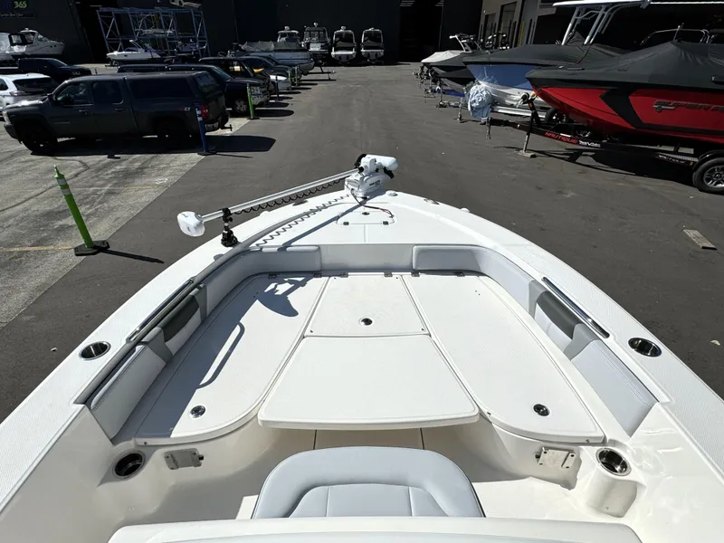 Slide: The Image of 2025 Robalo 226 Cayman boat deck, featuring spacious seating and modern design. - 14