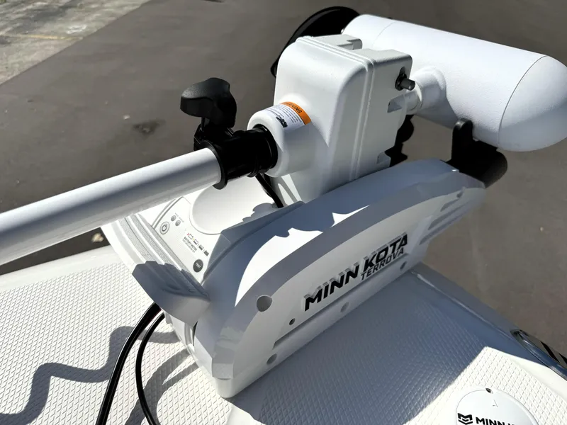 Slide: The Image of Minn Kota trolling motor on 2025 Robalo 226 Cayman boat deck. - 21