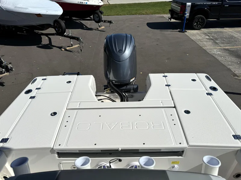 Slide: The Image of 2025 Robalo 226 Cayman boat with outboard motor, viewed from above. - 6