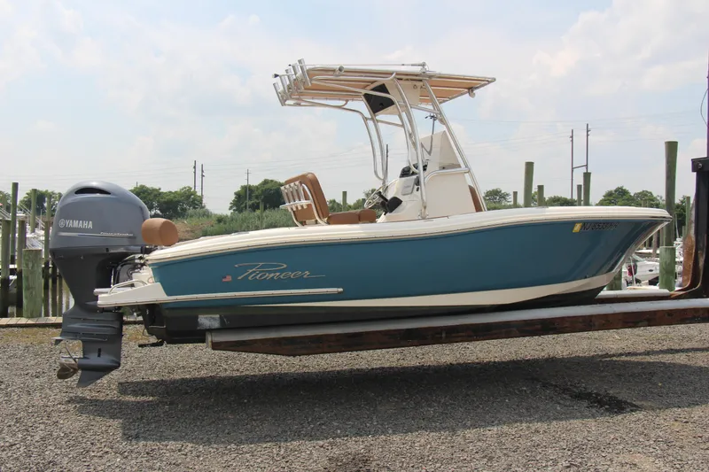Slide: The Image of 2022 Pioneer 202 Sportfish boat with Yamaha engine on display. - 2