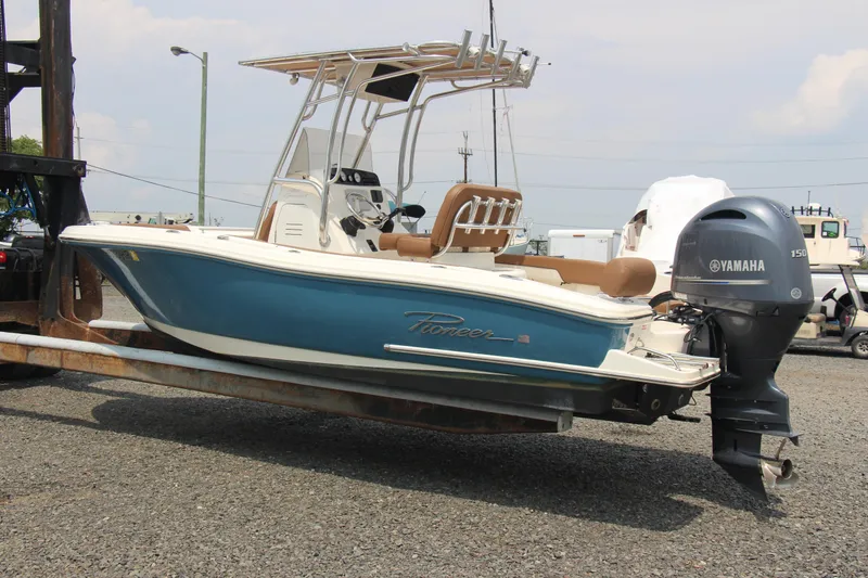 Slide: The Image of 2022 Pioneer 202 Sportfish boat with Yamaha outboard motor on trailer. - 3