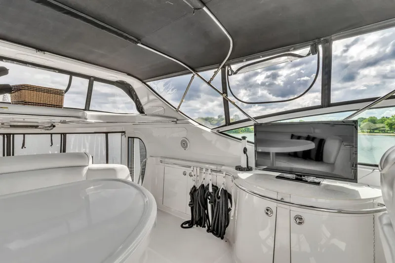Slide: The Image of Interior of 2004 Carver 466 Motor Yacht with modern amenities and scenic view. - 17