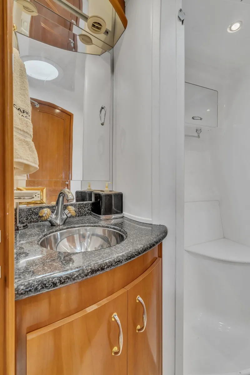 Slide: The Image of Luxurious bathroom in 2004 Carver 466 Motor Yacht with sleek sink and modern fixtures. - 41