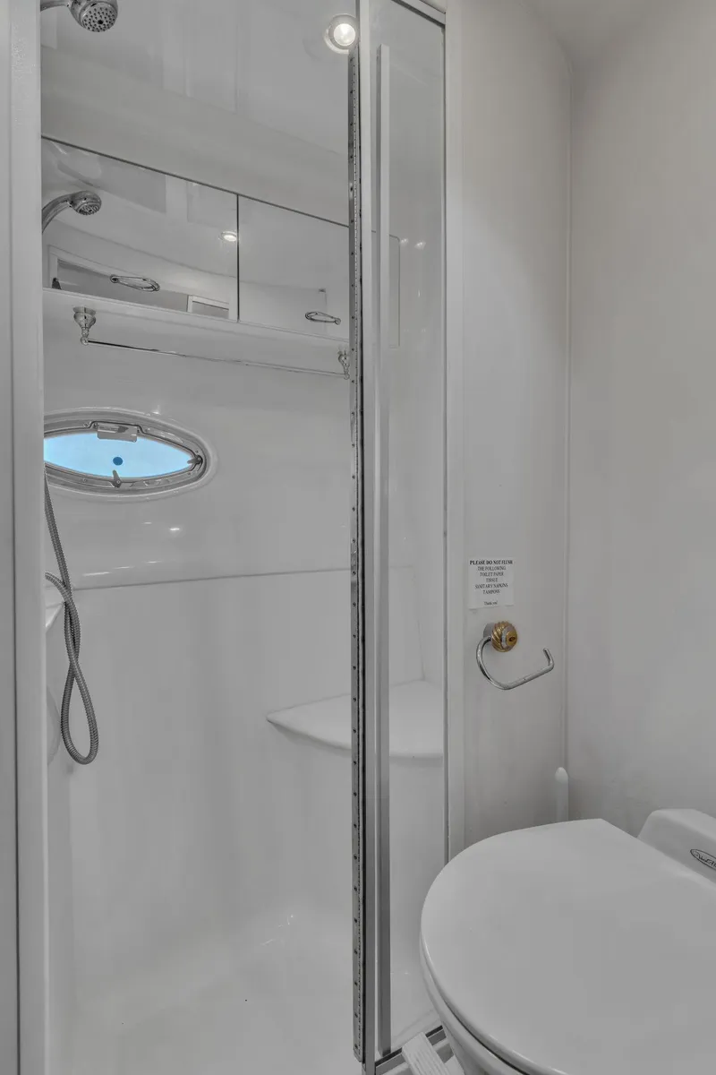 Slide: The Image of Bathroom interior of 2004 Carver 466 Motor Yacht with shower and toilet. - 42