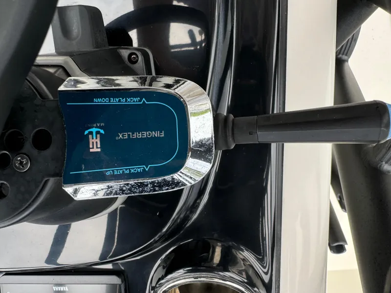 Slide: The Image of Close-up of 2024 Pathfinder 2500 Hybrid boat control lever. - 24
