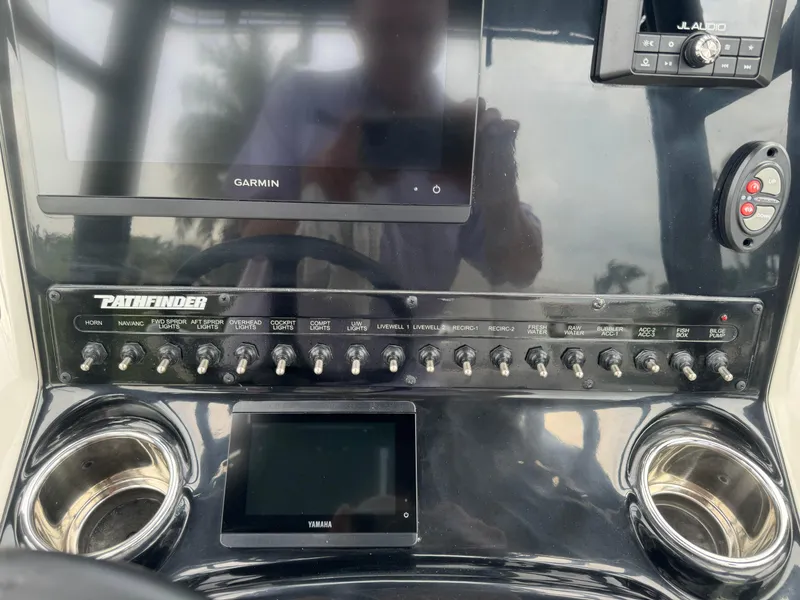 Slide: The Image of 2024 Pathfinder 2500 Hybrid dashboard with Garmin and Yamaha displays. - 25