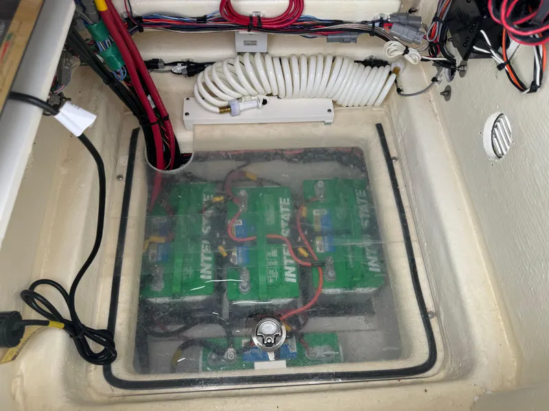 Slide: The Image of 2024 Pathfinder 2500 Hybrid battery compartment with wiring and ventilation system. - 37