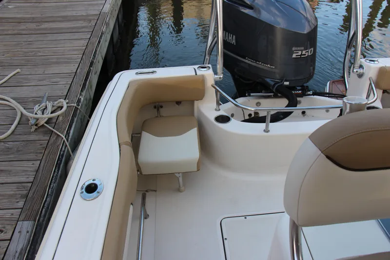 Slide: The Image of 2020 Pioneer 222 Sportfish boat with Yamaha 250 engine at dock. - 15