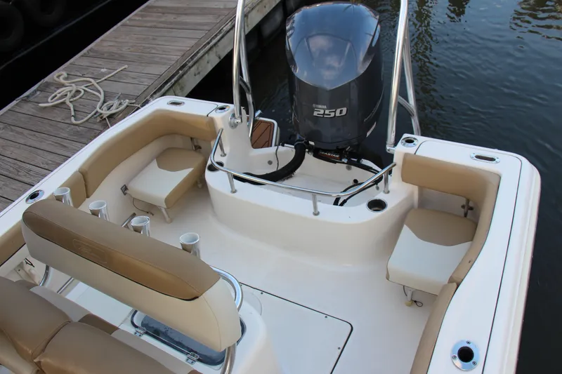 Slide: The Image of 2020 Pioneer 222 Sportfish boat with Yamaha 250 engine at dock. - 16