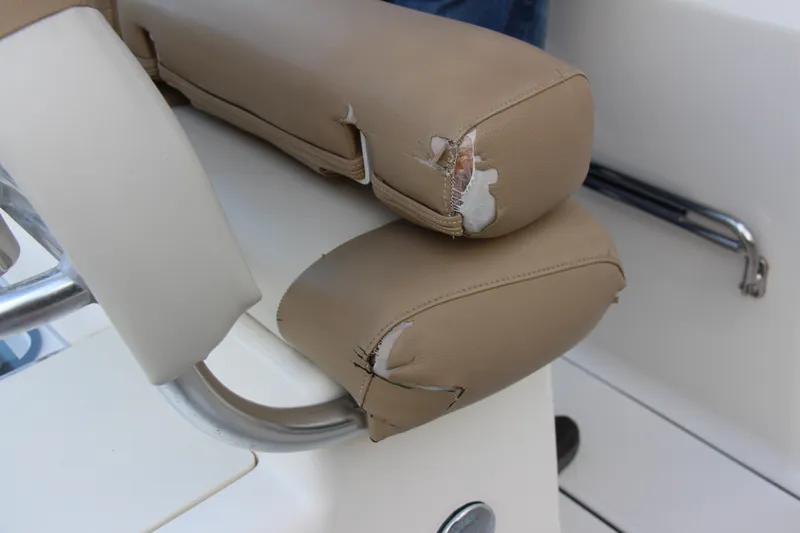 Slide: The Image of Damaged seat upholstery on 2020 Pioneer 222 Sportfish boat. - 19