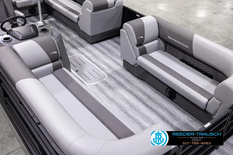 Slide: The Image of 2025 Bennington 21 SL pontoon boat interior with gray seating and flooring. - 12