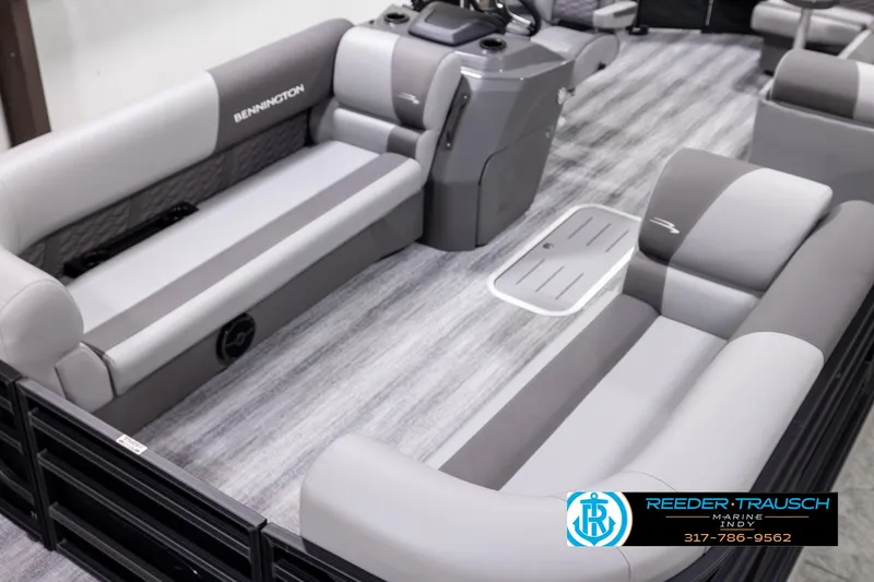 Slide: The Image of 2025 Bennington 21 SL pontoon boat interior with gray seating and modern design. - 13