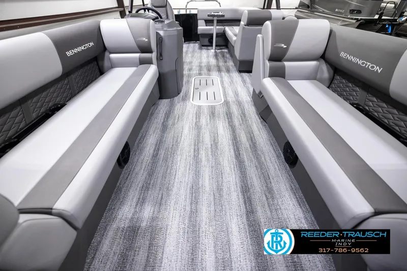 Slide: The Image of 2025 Bennington 21 SL pontoon boat interior with gray seating and flooring. - 14
