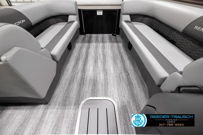 Slide: The Image of 2025 Bennington 21 SL boat interior with gray seating and carpet flooring. - 19
