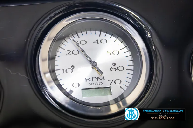 Slide: The Image of Close-up of 2025 Bennington 21 SL RPM gauge, showing 30 RPM x100. - 32