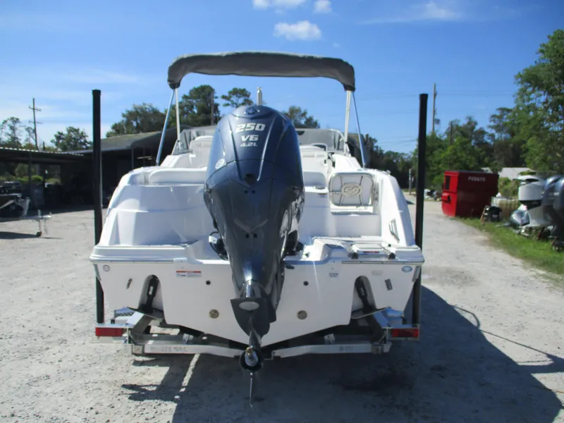 Slide: The Image of 2025 Sea Fox 228 Traveler boat with 250 V6 engine, parked outdoors. - 3