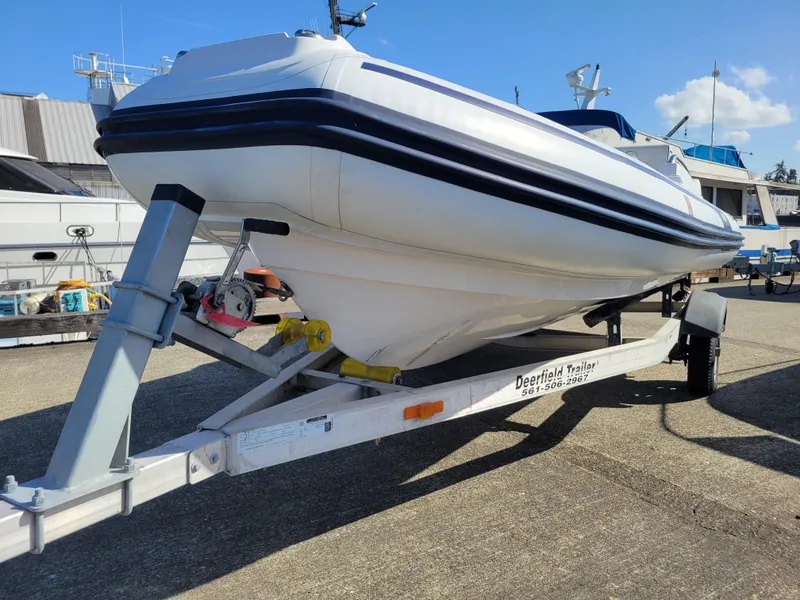 Slide: The Image of 2021 AB Inflatables ABJET 430XP boat on trailer, dockside view. - 17
