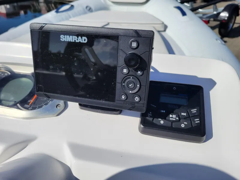 Slide: The Image of Simrad navigation system on 2021 AB Inflatables ABJET 430XP boat dashboard. - 22