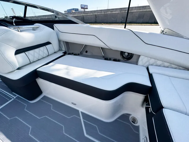 Slide: The Image of 2025 Regal LS4 boat interior with luxurious white seating and modern design. - 12