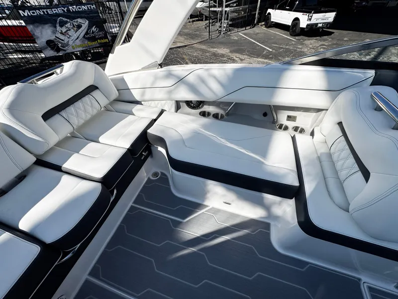 Slide: The Image of Luxurious 2025 Regal LS4 boat interior with white leather seating and modern design. - 15