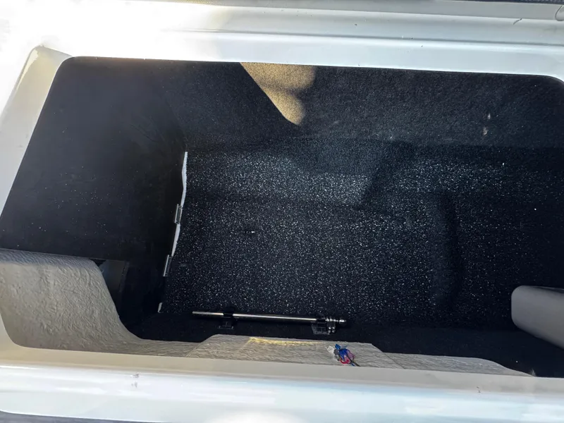 Slide: The Image of Spacious storage compartment in 2025 Regal LS4 boat. - 16