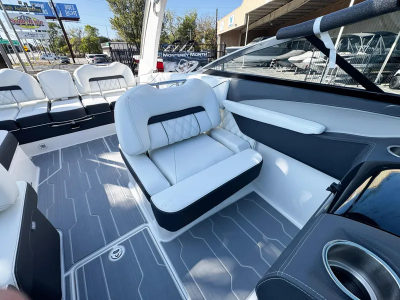 Slide: The Image of 2025 Regal LS4 boat interior with modern seating and sleek design. - 20