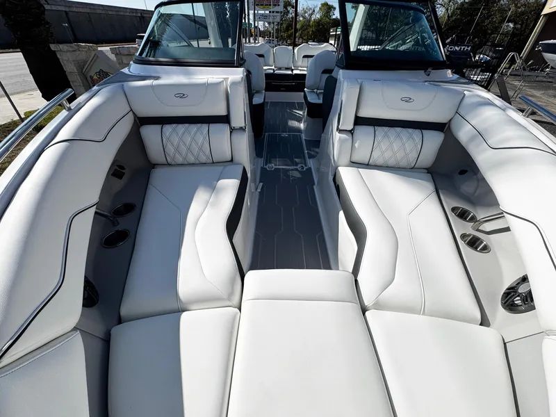 Slide: The Image of 2025 Regal LS4 boat interior with luxurious white seating and modern design. - 39