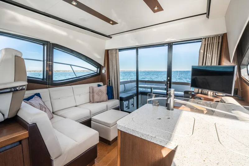 Slide: The Image of Luxurious interior of 2016 Sea Ray 400 Sundancer yacht with ocean view. - 18