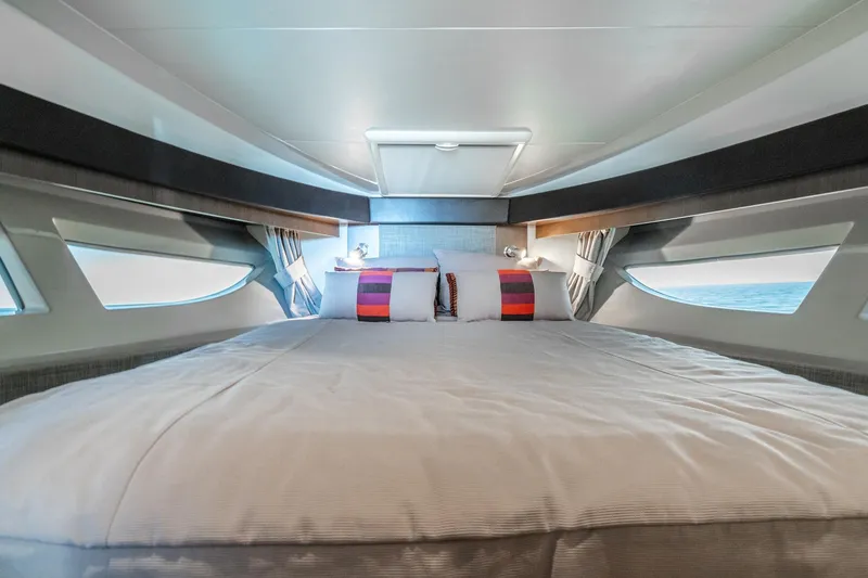 Slide: The Image of Luxurious bedroom interior of 2016 Sea Ray 400 Sundancer yacht with modern design. - 24