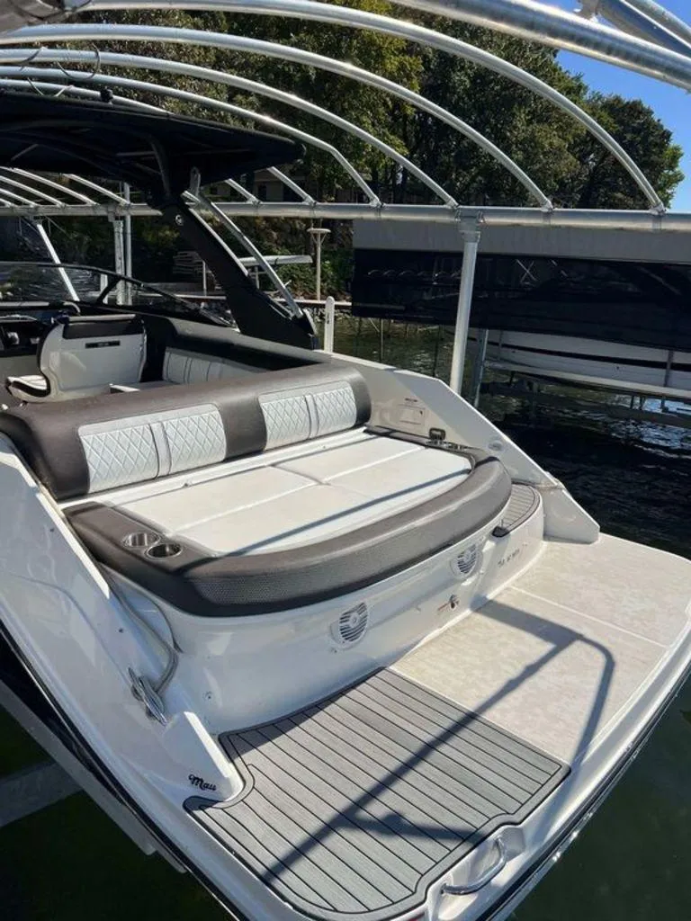 Slide: The Image of 2017 Sea Ray SLX 280 boat with spacious seating and sleek design. - 11