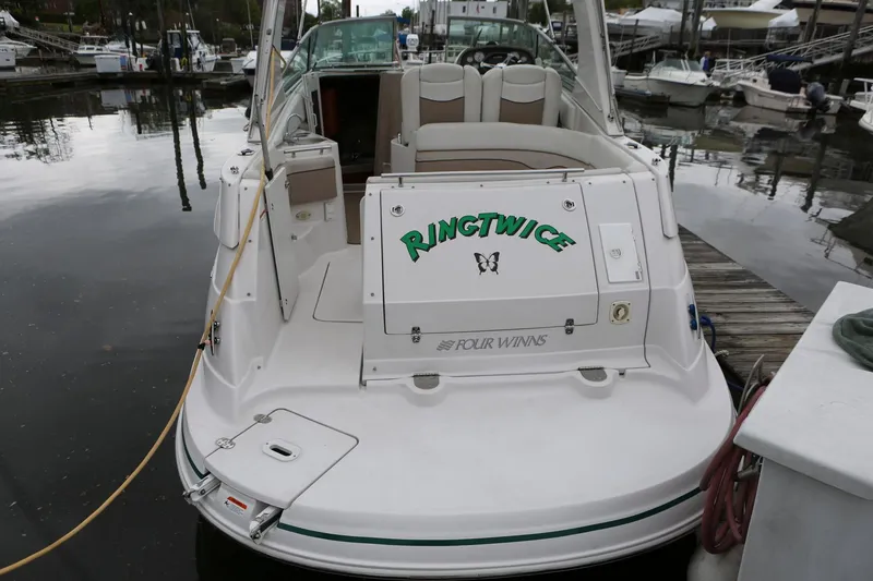 Slide: The Image of 2007 Four Winns 278 Vista boat docked at marina, rear view. - 10