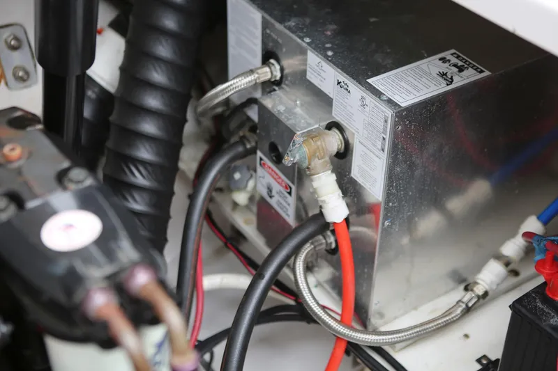 Slide: The Image of Engine compartment of 2007 Four Winns 278 Vista boat, showing wiring and components. - 22