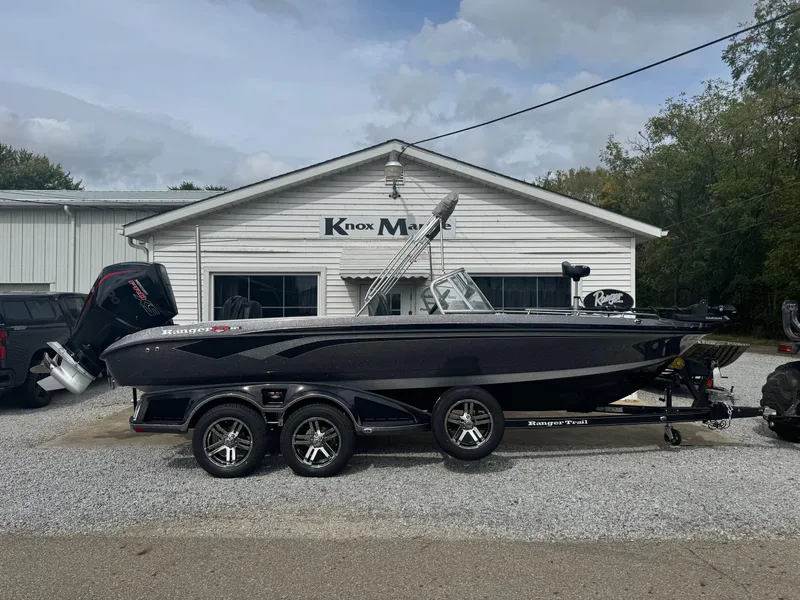 Slide: The Image of 2025 Ranger 621FS Ranger Cup boat parked outside Knox Marine dealership. - 1