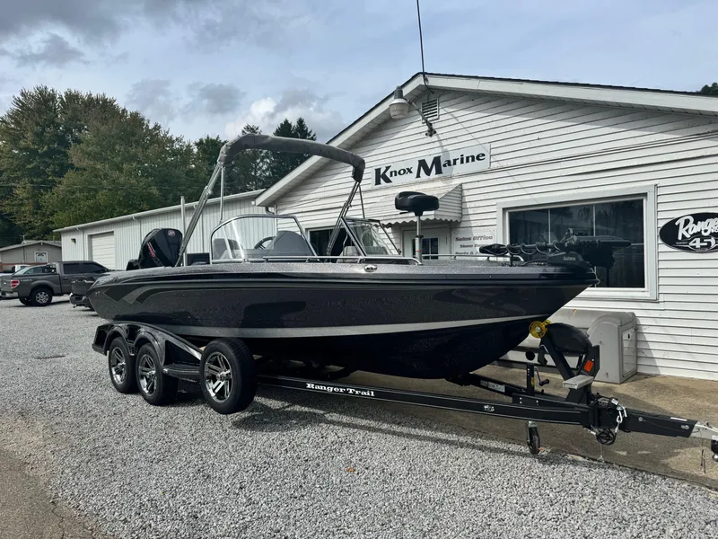 Slide: The Image of 2025 Ranger 621FS Ranger Cup boat on trailer outside Knox Marine. - 2