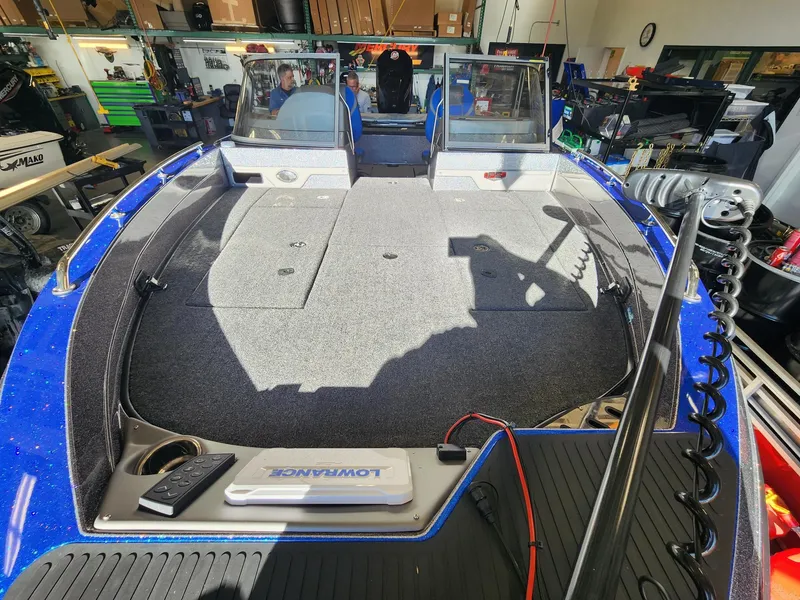 Slide: The Image of 2024 Ranger 620FS Ranger Cup Equipped boat interior with fishing gear and electronics. - 4