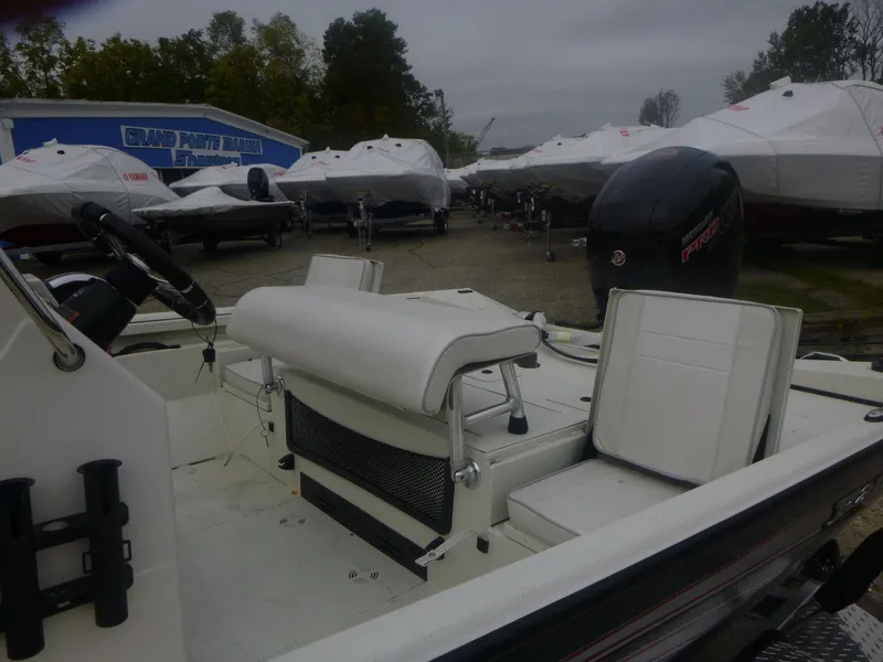 Slide: The Image of 2024 Ranger RB200 boat on trailer in indoor showroom. - 2