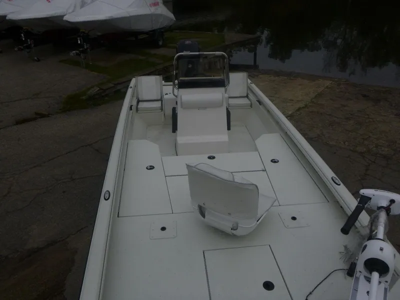 Slide: The Image of 2024 Ranger RB200 boat with Mercury Pro XS engine displayed indoors. - 4