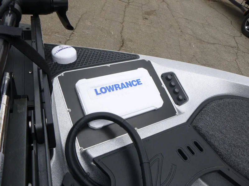 Slide: The Image of 2024 Ranger Z519 boat dashboard with Lowrance electronics and control panel. - 12