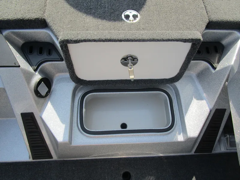 Slide: The Image of 2024 Ranger Z519 Ranger Cup Equipped boat storage compartment with lock and carpeted interior. - 15