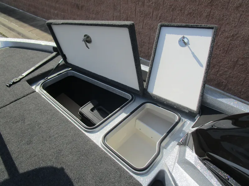 Slide: The Image of 2024 Ranger Z519 Ranger Cup Equipped boat storage compartments open. - 16