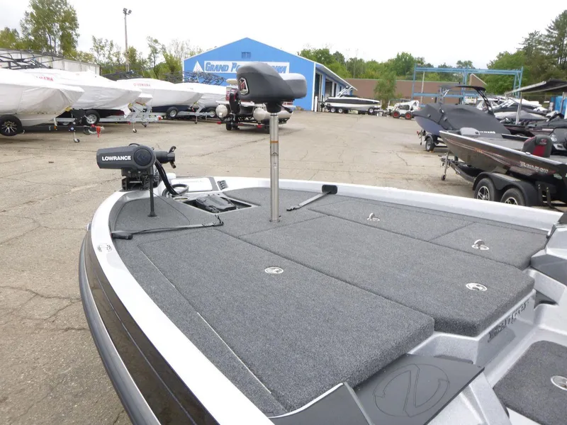 Slide: The Image of 2024 Ranger Z519 Ranger Cup Equipped boat at dealership, featuring spacious deck and advanced equipment. - 18