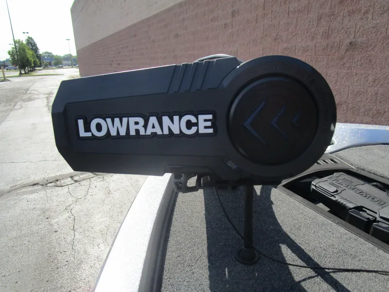 Slide: The Image of 2024 Ranger Z519 boat with Lowrance equipment, parked outdoors. - 19